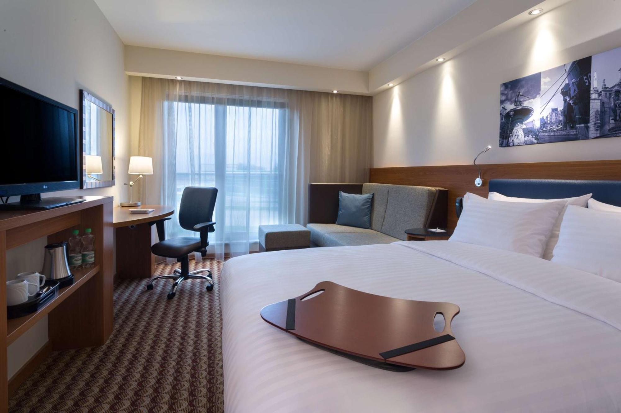 Kamer met Queensize Bed en Slaapbank